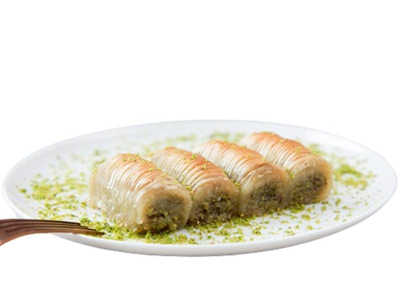 Pistachio Yellow Twisted Rolls – Premium Middle Eastern Pastry
